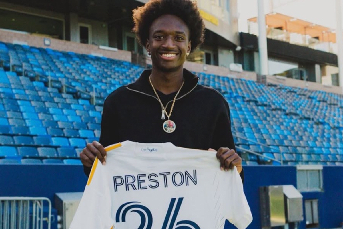 eric-preston-signs-his-first-professional-contract 